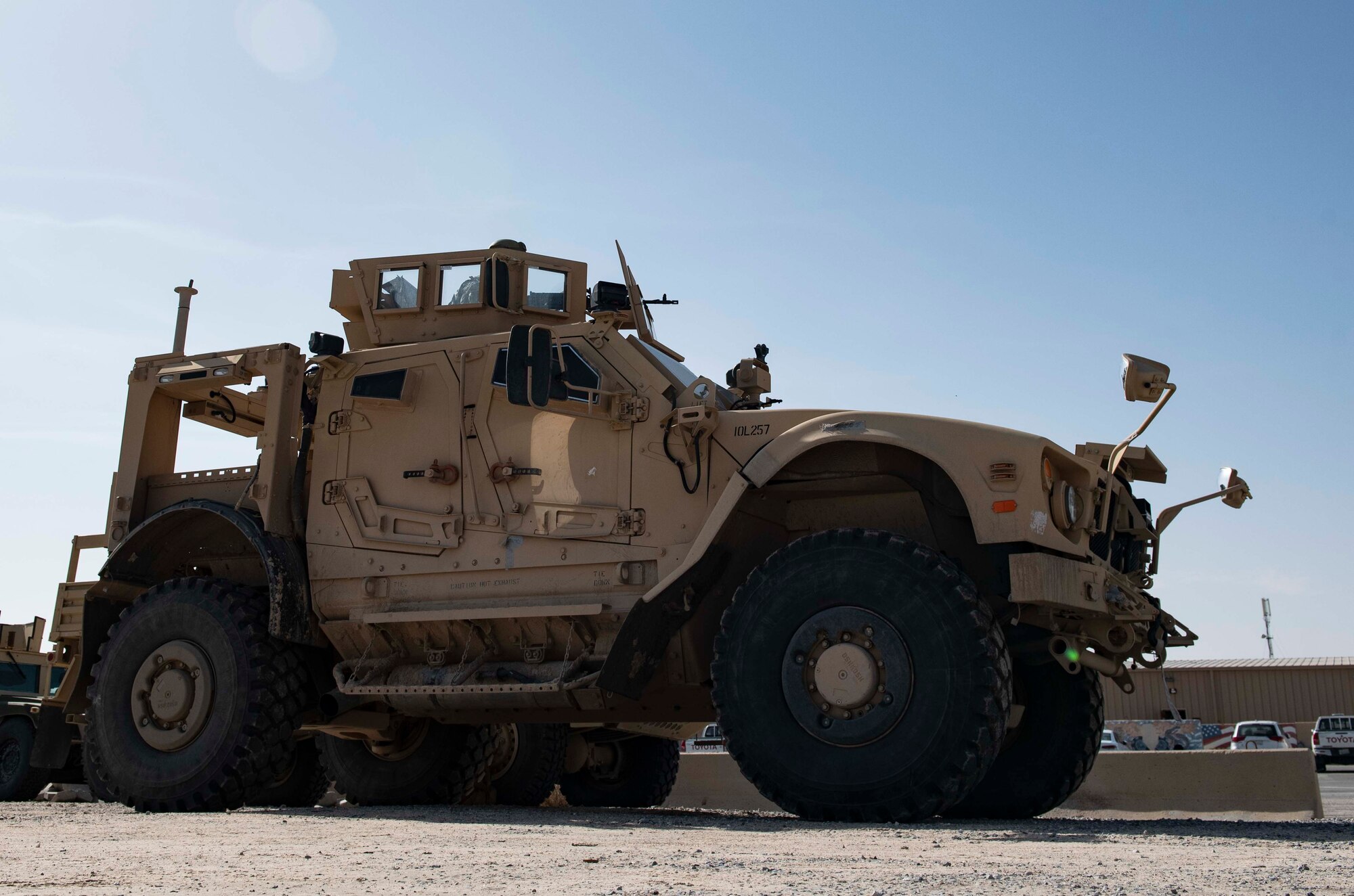 U.S. Air Force Senior Airmen Kenneth Hunter, 386th Expeditionary Security Forces Squadron response force member, secures an M240 machine gun to the turret of a mine-resistant ambush protected all-terrain vehicle, or M-ATV, at Ali Al Salem Air Base, Kuwait, Dec. 9, 2020. The M-ATV is designed to operate on every area of the battlefield and can be configured for a wide array of mission requirements, force structures and threats. (U.S. Air Force photo by Staff Sgt. Kenneth Boyton)