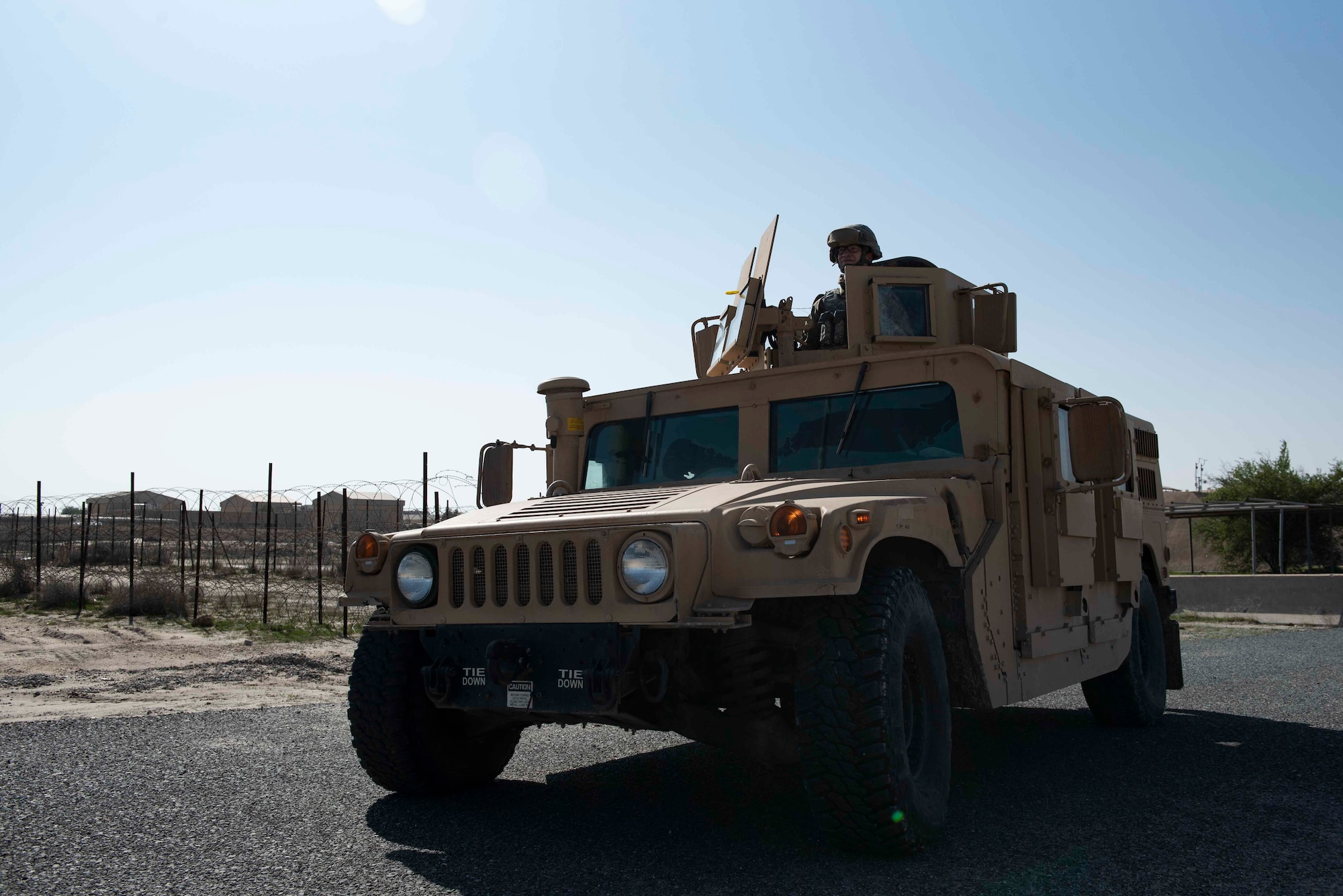 A U.S. Air Force Airman assigned to the 386th Expeditionary Security Forces Squadron, scans his area of responsibility during the Marauder 21-02 exercise at Ali Al Salem Air Base, Kuwait, Dec. 8, 2020. The exercise was comprised of multiple, complex situations that the Airmen had to deescalate. (U.S. Air Force photo by Staff Sgt. Kenneth Boyton)
