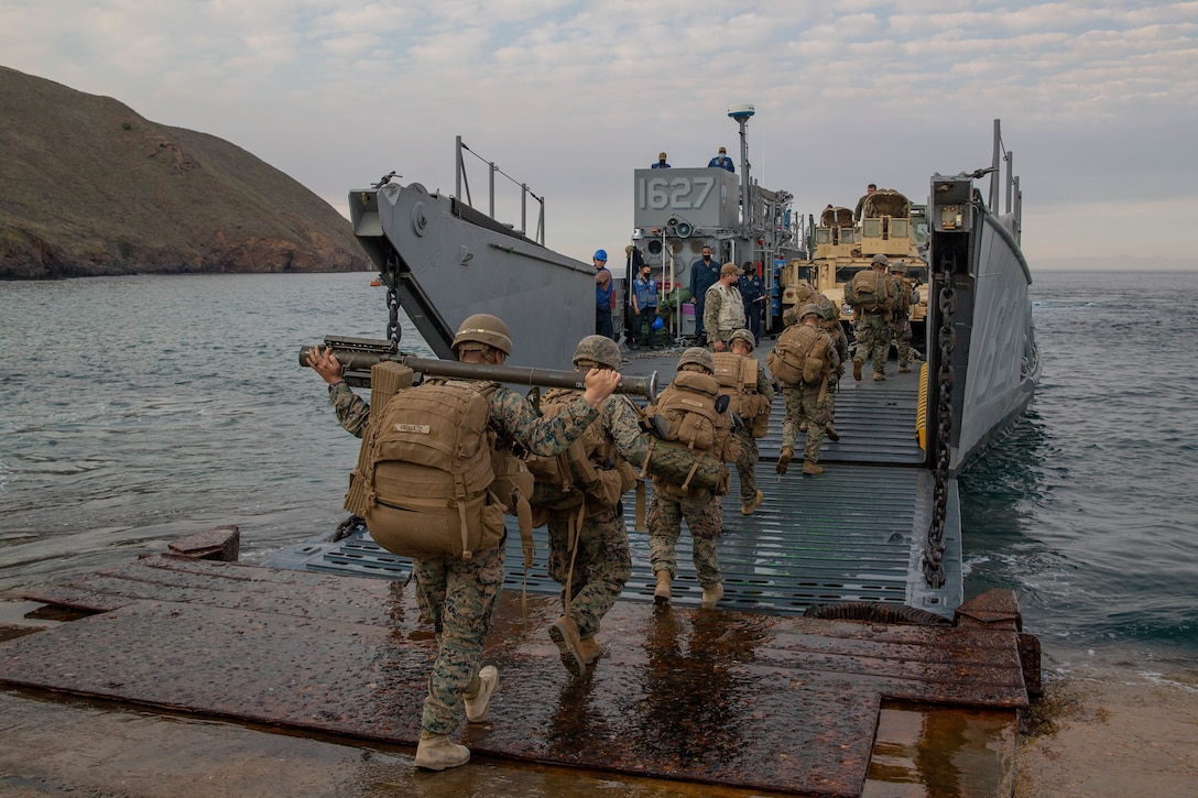 U.S. Marines and sailors board a landing craft utility (LCU) on San Clemente Island, Dec. 8.
