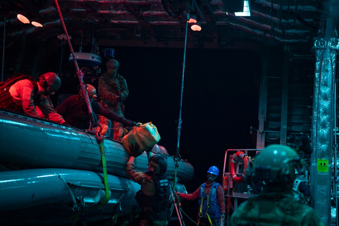 The Independence-variant littoral combat ship USS Gabrielle Giffords (LCS 10) with embarked U.S. Coast Guard Law Enforcement Detachment (LEDET) conducts enhanced counter narcotics operations, Dec. 2, 2020.