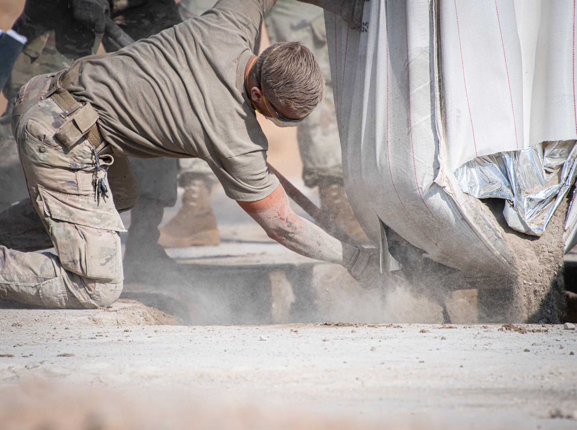 Airmen from the 378th Expeditionary Civil Engineer Squadron repair a roadway as part of an exercise Dec. 4, 2020, at Prince Sultan Air Base, Kingdom of Saudi Arabia.