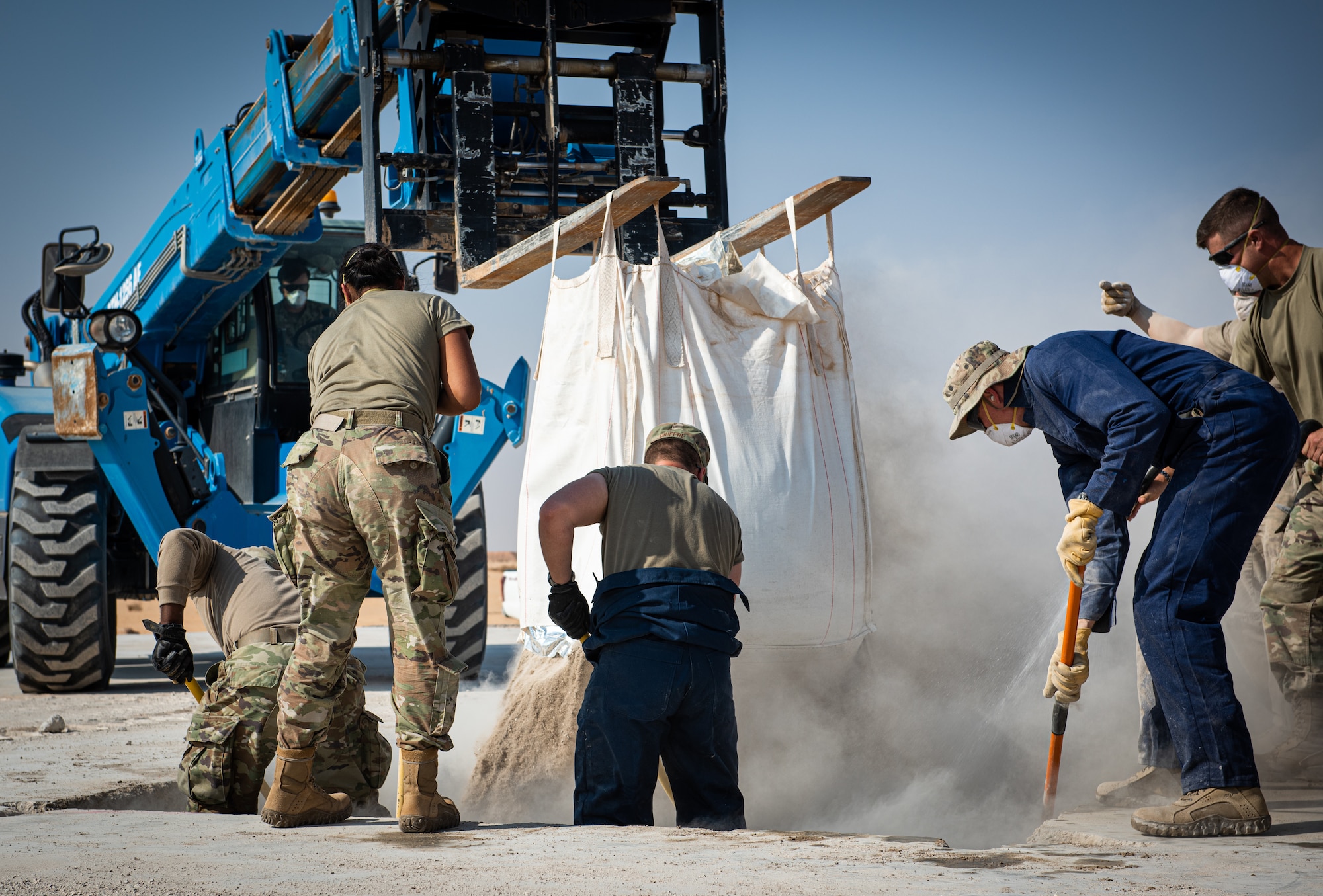 Airmen from the 378th Expeditionary Civil Engineer Squadron repair a roadway as part of an exercise Dec. 4, 2020, at Prince Sultan Air Base, Kingdom of Saudi Arabia.