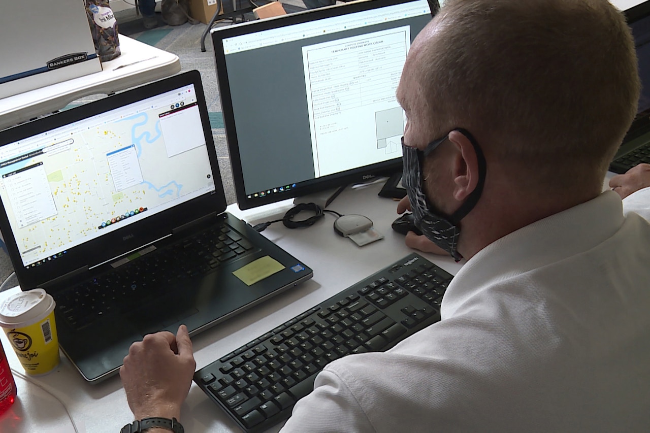 A person works on a computer.