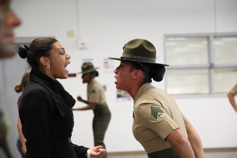 An NCO yells at a recruit.