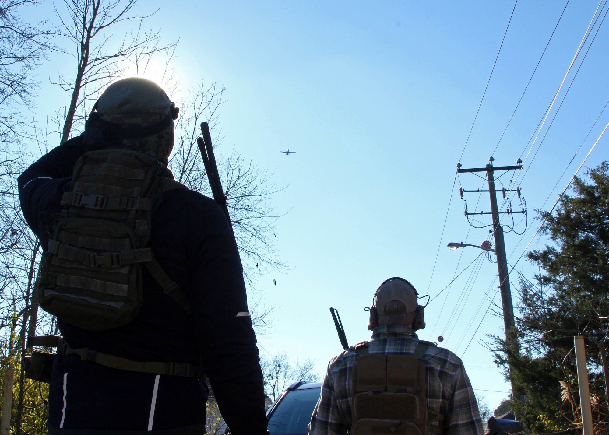 (right) U.S. Air Force Tech. Sgt. Timothy Davis, a standards and evaluations program manager with the 146th Air Support Operations Squadron, Oklahoma Air National Guard, and joint terminal attack controllers from Estonia watch an A-10C Thunderbolt II aircraft assigned to the 104th Fighter Squadron, Maryland Air National Guard, during close air support training in Vienna, Maryland, on Dec. 8, 2020.