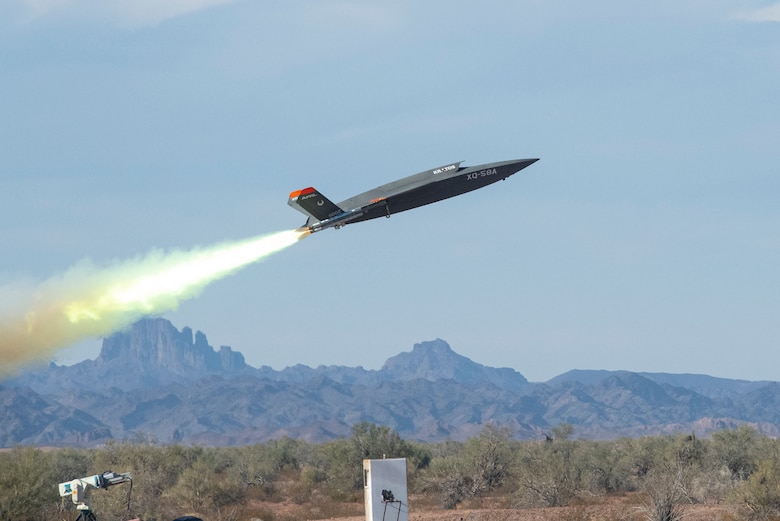 An XQ-58A Valkyrie low-cost unmanned aerial vehicle launches at the U.S. Army Yuma Proving Ground, Ariz., Dec. 9, 2020. The acquisition team - comprised of Air Force Research Laboratory and Air Force Life Cycle Management Center personnel working in conjunction with Eglin Air Force Base, Fla.'s 46th Test Squadron - came together to conduct the historic test.