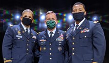 From left, 2nd Lt. Jose Montalvo, 49th Missile Defense Battalion, Alaska National Guard; Lt. Gen. Daniel L. Karbler, commanding general, U.S. Army Space and Missile Defense Command; and 2nd Lt. Ira Jinkins, 100th Missile Defense Brigade, Colorado National Guard, stand for a photo following the Air Defense Artillery Basic Officer Leader Course graduation ceremony at McMahon Memorial Auditorium at Fort Sill, Oklahoma, Dec. 4, 2020. Jinkins was the course Honor Graduate and Montalvo earned the Col. Tedesco Leadership Award. (Photo provided)