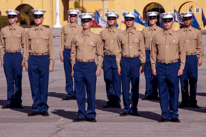 New Marines of Alpha Company, 1st Recruit Training Battalion, stand in formation during a graduation ceremony at Marine Corps Recruit Depot, San Diego, Dec. 11, 2020.