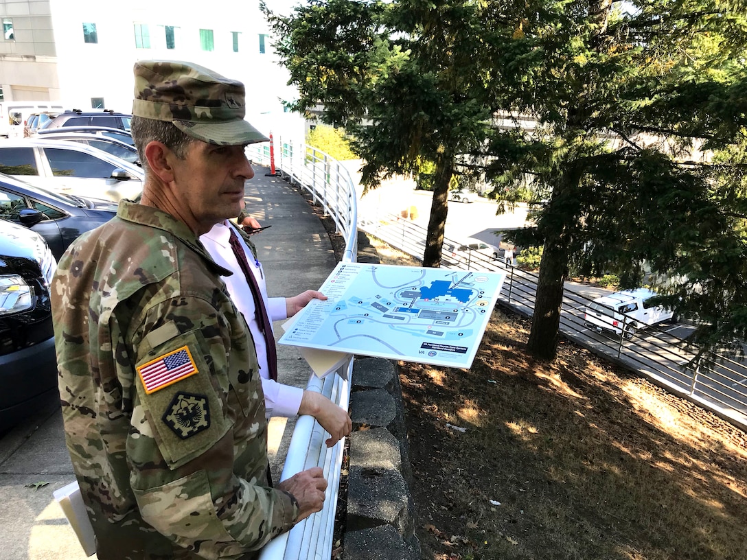 Brigadier General Peter Helmlinger, Northwestern Division commander, toured the Portland Veteran's Affairs Medical Center (PVAMC) with Portland District, U.S. Army Corps of Engineers team members who are working on designs and plans to retrofit the PVAMC, Sept. 28, 2018. The tour was a way for District staff to discuss the difficulties the team will face during seismic retrofitting.