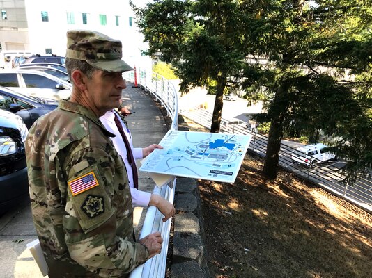 Brigadier General Peter Helmlinger, Northwestern Division commander, toured the Portland Veteran's Affairs Medical Center (PVAMC) with Portland District, U.S. Army Corps of Engineers team members who are working on designs and plans to retrofit the PVAMC, Sept. 28, 2018. The tour was a way for District staff to discuss the difficulties the team will face during seismic retrofitting.