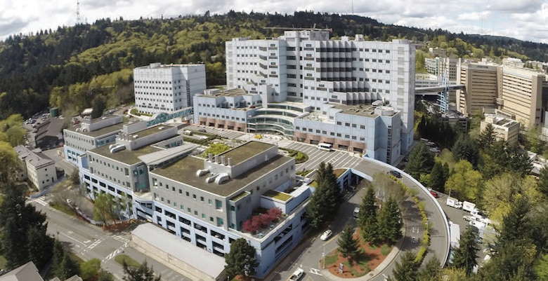 The Portland Veterans Affairs Medical Center campus sits on a 450-foot-tall basalt-rock hill south of downtown. Marquam Hill is also crowded with homes, steep slopes and daily commuters (during non-pandemic times), making construction a difficult challenge that engineers and designers are grappling with as they make plans for a seismic retrofit of the hospital.