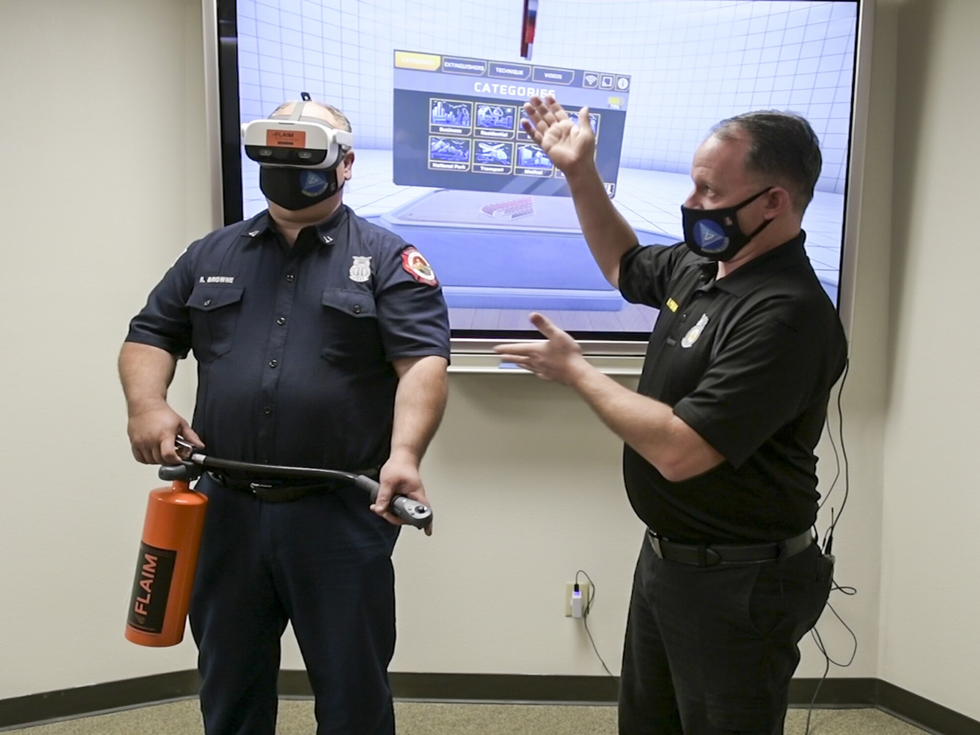 Mike Pinan, Assistant Chief for Fire Prevention, showcases the latest Edwards AFB Fire and Emergency Services' newest training tool. (Air Force photo by Giancarlo Casem)