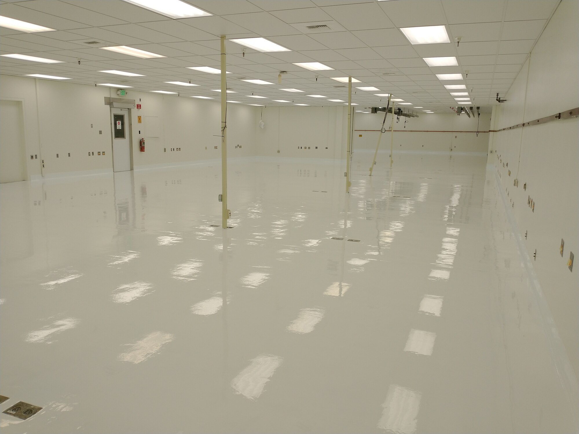 A floor repair project recently wrapped up at the Precision Measurement Equipment Laboratory on Edwards Air Force Base, California. The repair project was identified as mission need and was funded by the Air Force Materiel Command’s “AFMC We Need” initiative. (Air Force photo by Arcardio Garcia, 412th CES)