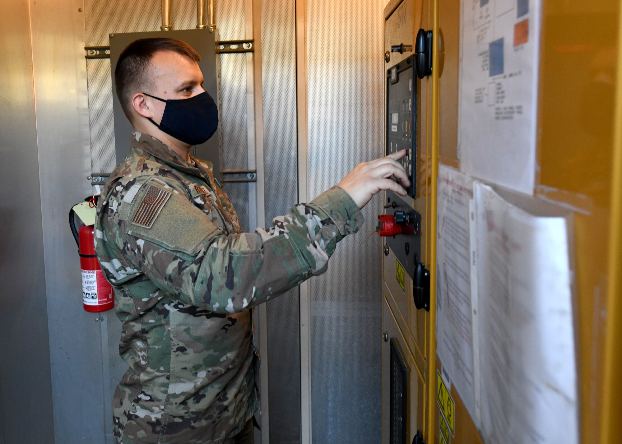 Tech. Sgt. Michael Reniewicz, 104th Fighter Wing power production shop leader, performs routine power system testing on base generators on December 10, 2020 at Barnes Air National Guard Base. This routine testing ensures power reliability in the event of a commercial loss of power. (U.S. Air National Guard Photo by Airman 1st Class Camille Lienau)