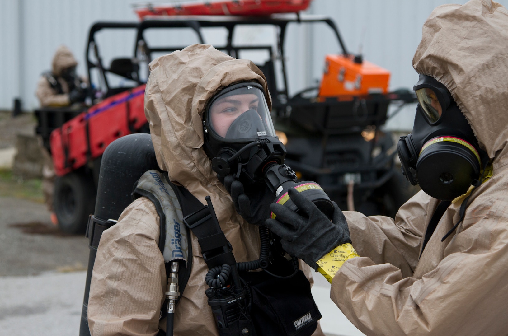 Sgt. Karlee Jones waits for her gas mask to be removed on October 28, 2020 at The Central Missouri Events Center in Columbia, Missouri. Sgt. Jones finished a training exercise involving a biological threat.