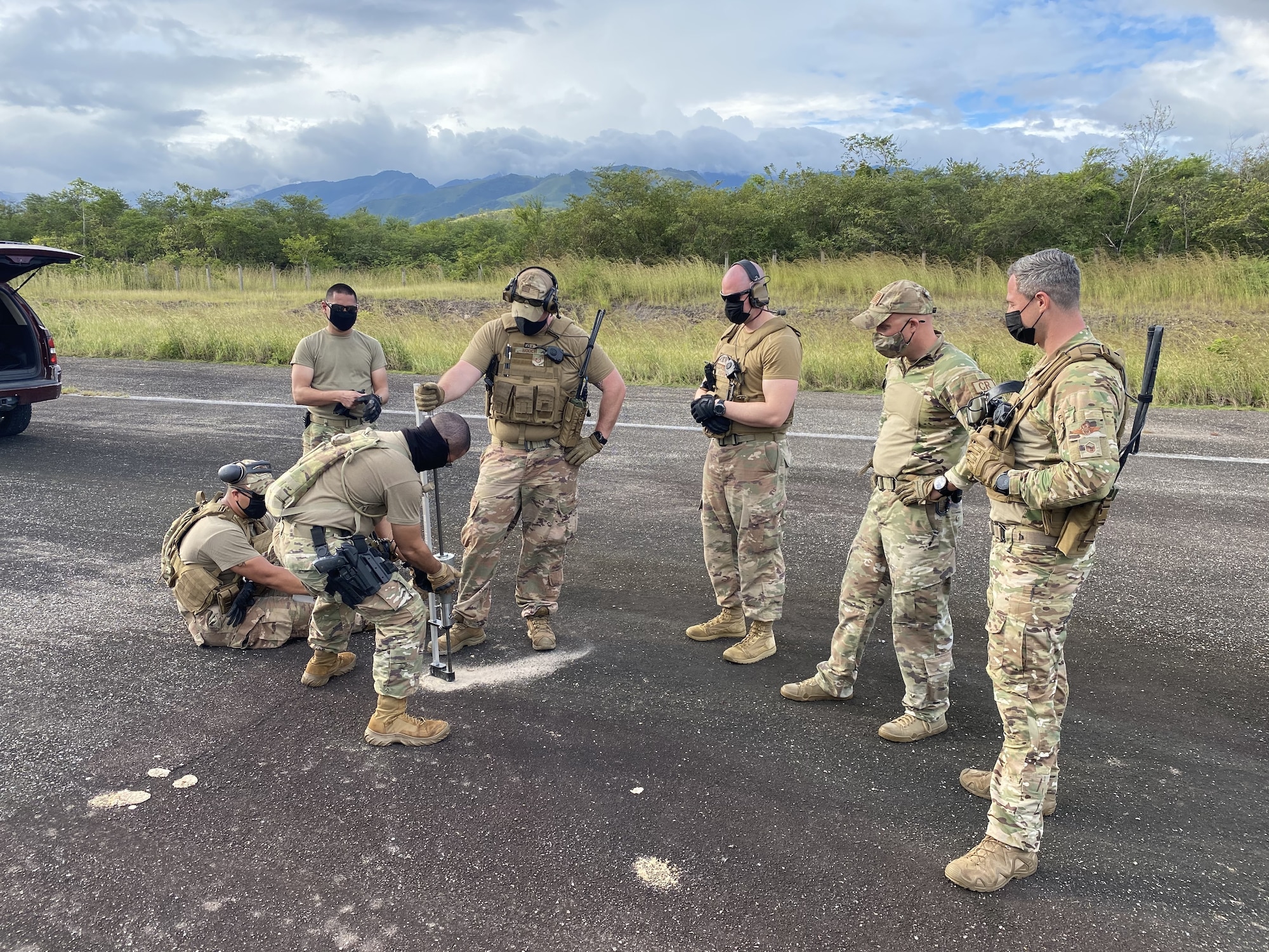 U.S. Airmen from the 621st Contingency Response Group Alpha Mike team assess the pavement strength of Aguacate landing zone in Catacamas, Honduras, Nov. 24, 2020. CRG airfield assessment teams help make it possible to provide aid and relief to federal, state and international agencies impacted by natural disasters. (U.S. Air Force photo)
