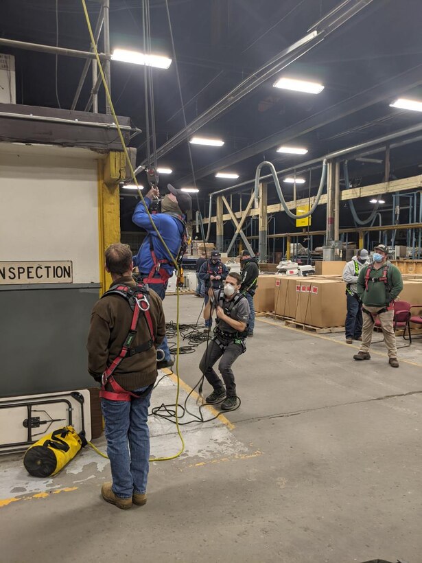 Corps’ students experience hands-on training using equipment to access confined spaces. Pictured from left: Mike Weeter, Willie Maynard, MSA Instructor, Jordan Frye