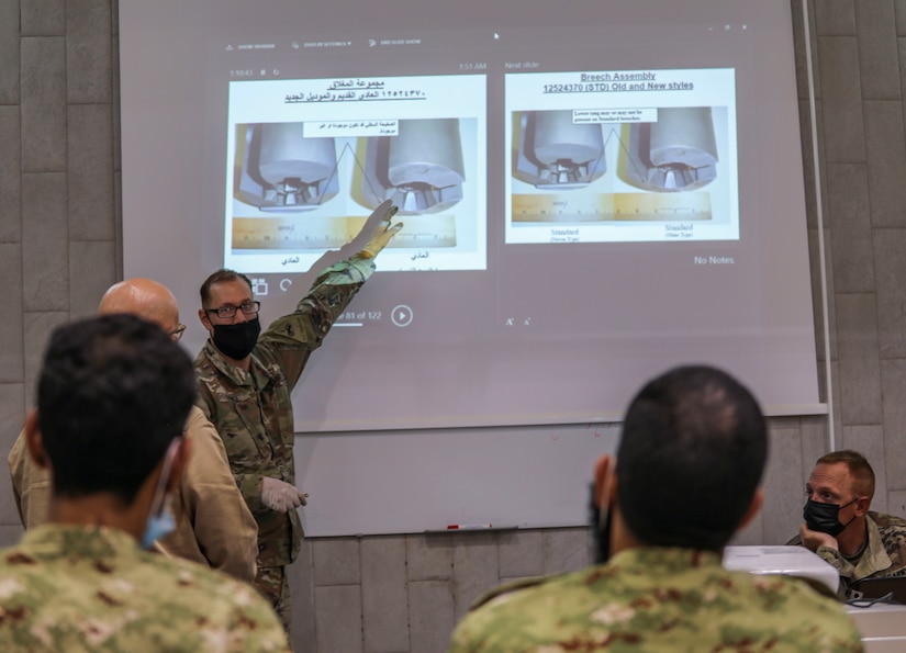 Staff Sgt. Christopher Doyle, 2nd Armored Brigade Combat Team, 1st Armored Division, brigade master gunner instructs Soldiers from the Kuwait National Guard on the M242 Bushmaster near Kuwait City, Kuwait, November 29, 2020. 2ABCT is deployed to southwest Asia in support of Operation Spartan Shield to support regional partners and sustain stability in the region. (U.S. Army Photo by: Staff Sgt. Michael West)