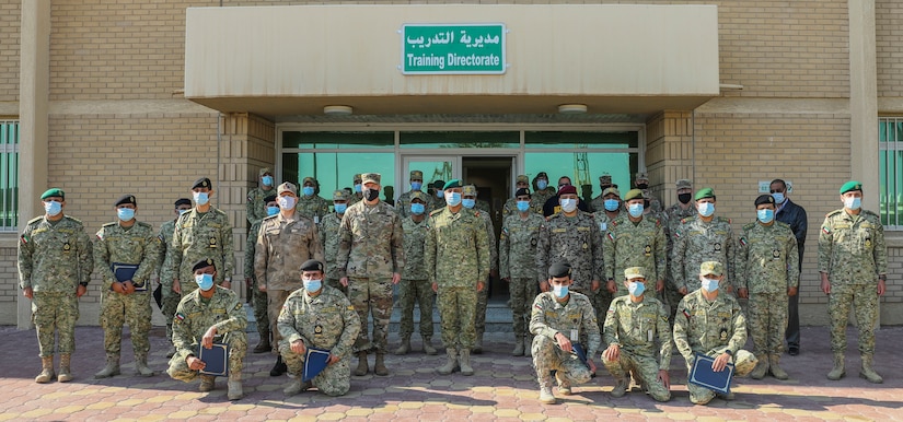 In a socially distanced ceremony full of senior military leaders from the Kuwait National Guard and 2nd Armored Brigade Combat Team, 1st Armored Division, Soldiers of the KNG were awarded course completion certificates near Kuwait City, Kuwait on December 7, 2020. 2ABCT is deployed to southwest Asia in support of Operation Spartan Shield to support regional partners and sustain stability in the region. (U.S. Army Photo by: Staff Sgt. Michael West)