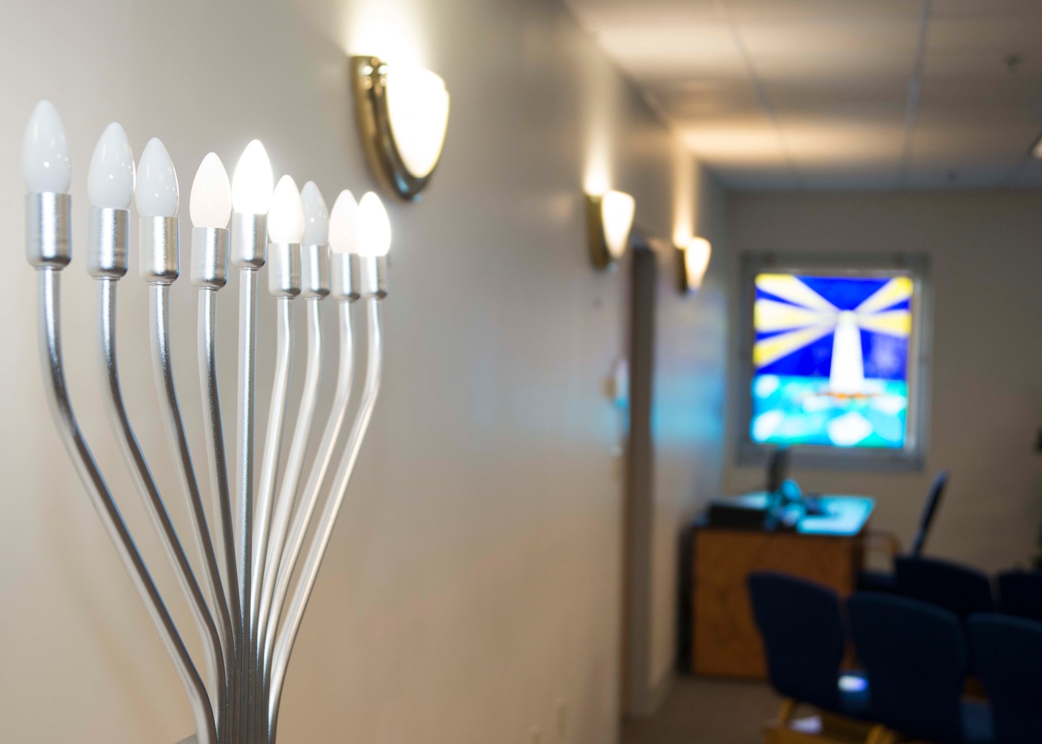 An electric menorah is on display during Hanukkah Alive in Naval Medical Center Portsmouth’s (NMCP) Chapel on Dec. 11.