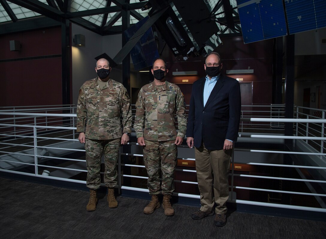 From left to right, Lt. Gen. Thomas Bussiere, United States Strategic Command deputy commander; Lt. Gen. John Shaw, United States Space Command deputy commander; and Ambassador Marshall S. Billingslea, Special Presidential Envoy for Arms Control, pose for a photo Dec. 15, 2020, at USSPACECOM headquarters at Peterson Air Force Base, Colorado.