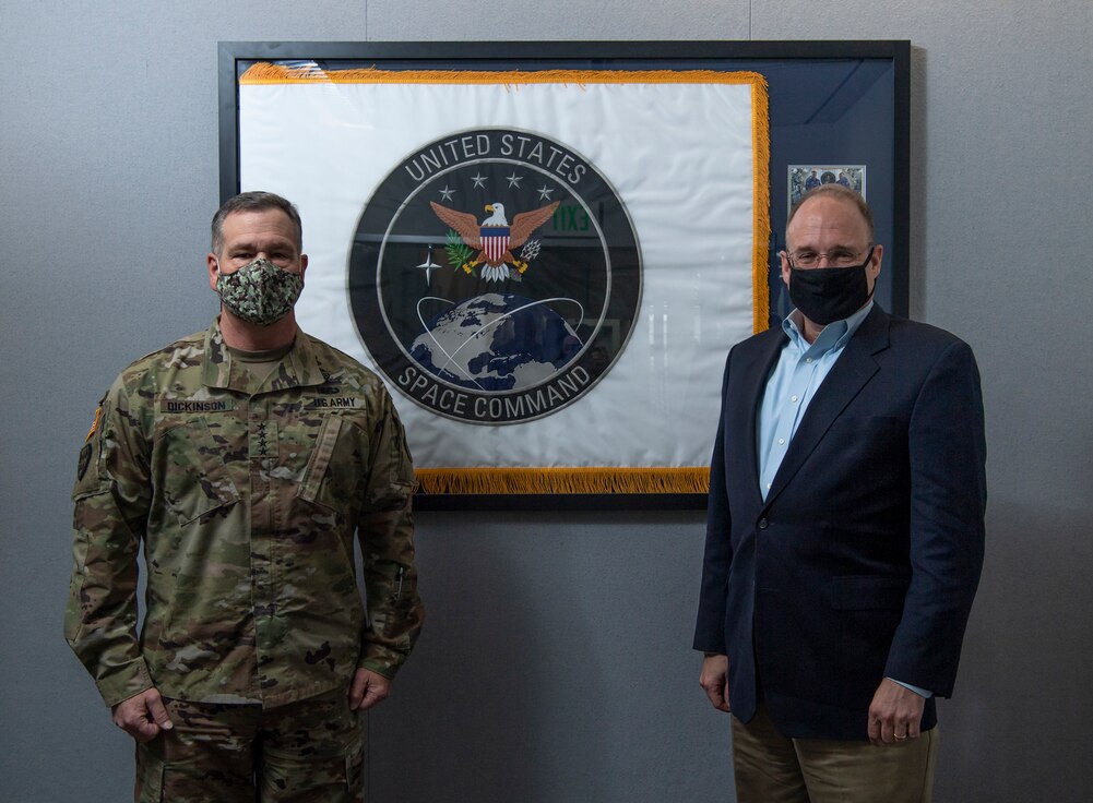 U.S. Army Gen. James Dickinson, United States Space Command commander, and Ambassador Marshall Billinglea, Special Presidential Envoy for Arms Control, pose for a photo Dec. 15, 2020, at USSPACECOM  headquarters at Peterson Air Force Base, Colorado.