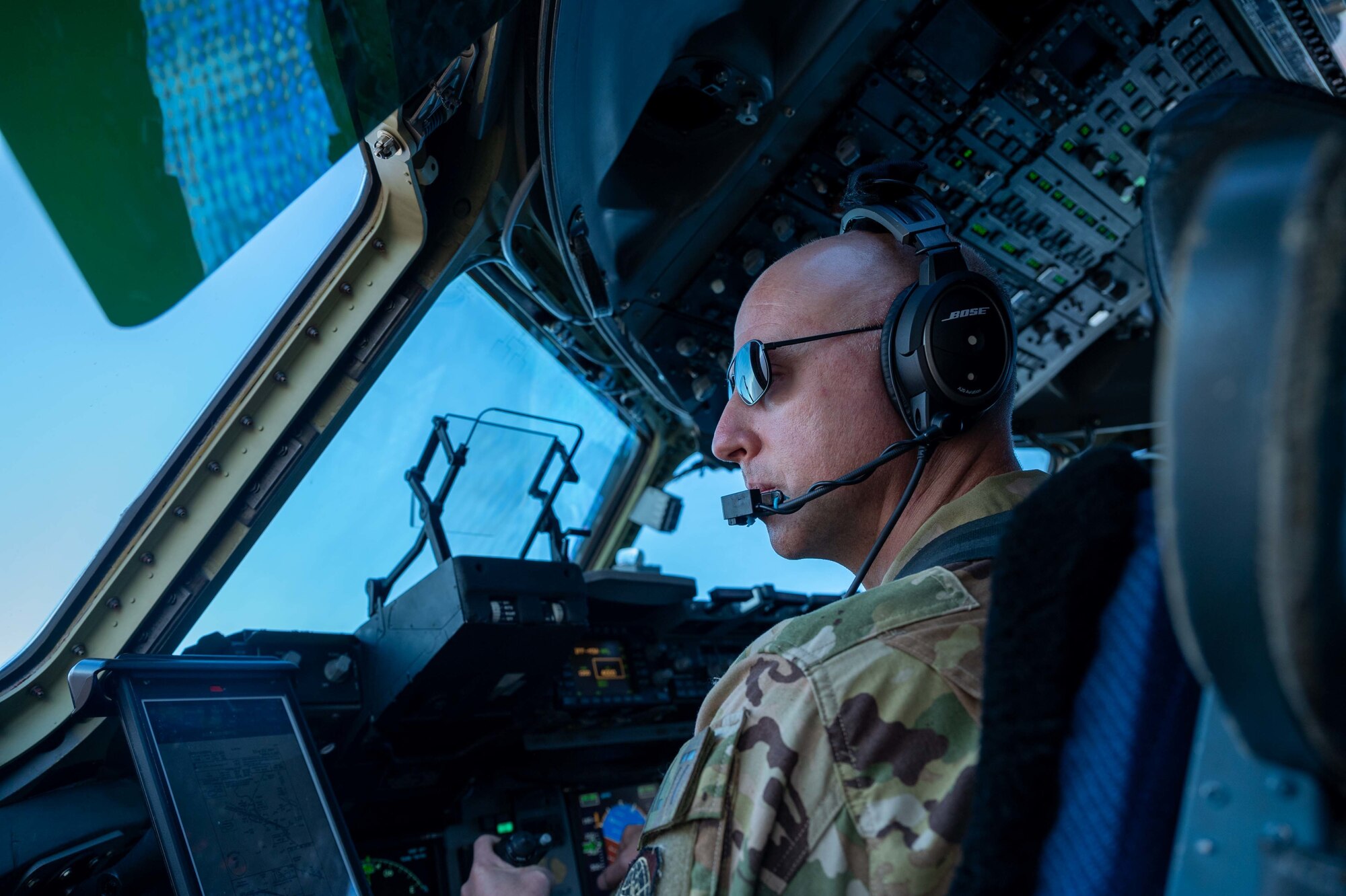 Maj. James Kovarovic, 3rd Airlift Squadron instructor pilot, flies a C-17 Globemaster III while practicing threat reactions with flares over a training field in Pennsylvania, Dec. 10, 2020. The 3AS routinely conducts training in preparation for global airlift missions to include combat zones. This was Kovarovic’s final flight prior to retirement after serving for 20 years. (U.S. Air Force photo by Airman 1st Class Faith Schaefer)
