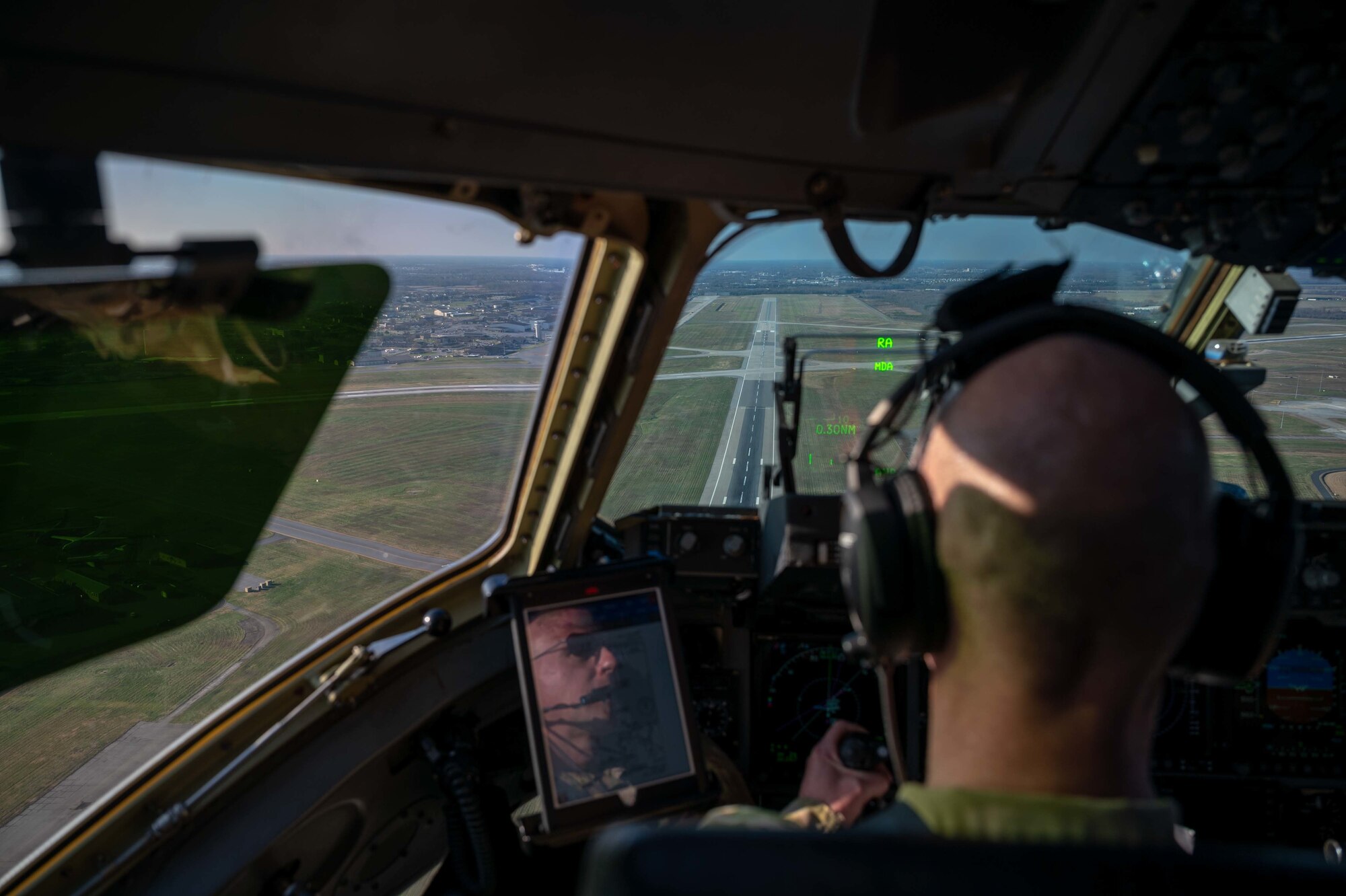 Maj. James Kovarovic, 3rd Airlift Squadron instructor pilot, prepares to land a C-17 Globemaster III at Dover Air Force Base, Delaware, following a training mission on Dec. 10, 2020. The 436th Airlift Wing operates routine training missions to maintain mission readiness. (U.S. Air Force photo by Airman 1st Class Faith Schaefer)