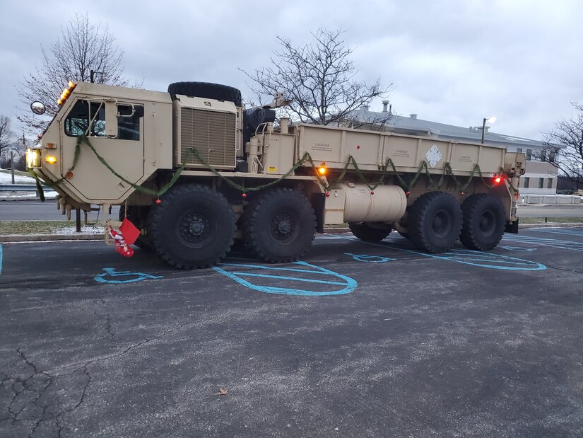 A truck with holiday decorations during Park & Presents, an event held Dec. 8-10 where children of deployed 28th ECAB Soldiers enjoyed a drive-thru style visit with Santa and received a bag of toys. (Courtesy Photo by Rebecca Leidy)