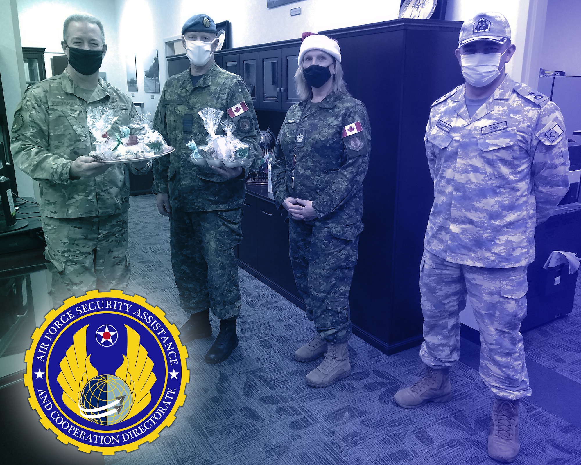 AFSAC Director Brig. Gen. Bruckbauer and USAF International Partners share holiday treats from different countries together in the AFSAC Directorate headquartered at WPAFB, Ohio.