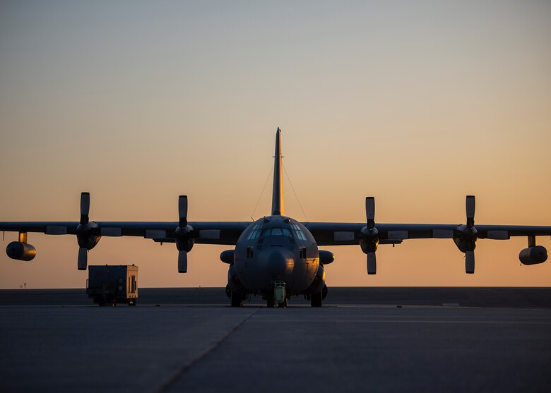 A U.S. Air Force EC-130H Compass Call assigned to 41st Expeditionary Electronic Combat Squadron sits parked on the ramp at Al Dhafra Air Base, United Arab Emirates, Dec. 2, 2020.