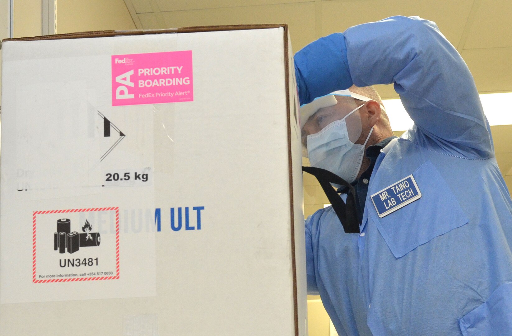 Staff Naval Hospital Jacksonville unpack the first delivery of the Coronavirus (COVID-19) vaccinination on Dec. 15.