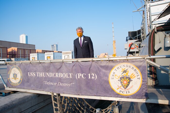 201215-N-IO414-1170 NAVAL SUPPORT ACTIVITY BAHRAIN (Dec. 15, 2020) Secretary of the Navy Kenneth J. Braithwaite departs the patrol coastal ship USS Thunderbolt (PC 12) during his visit with personnel on board U.S. Naval Support Activity Bahrain, Dec. 15. Thunderbolt is deployed to the U.S. 5th Fleet area of operations in support of naval operations to ensure maritime stability in the Central Region, connecting the Mediterranean and Pacific through the Western Indian Ocean and three critical chokepoints to the free flow of global commerce.