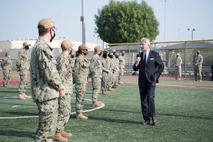 Secretary of the Navy Kenneth J. Braithwaite speaks to Sailors at an all-hands call during a visit to Naval Support Activity Bahrain, Dec 15. U.S. Naval Forces Central Command is the U.S. Navy element of U.S. Central Command in the U.S. 5th Fleet area of operations and encompasses about 2.5 million square miles of water area and includes the Arabian Gulf, Gulf of Oman, Red Sea and parts of the Indian Ocean. The expanse is comprised of 20 countries and includes three critical choke points at the Strait of Hormuz, the Suez Canal and the Strait of Bab al Mandeb at the southern tip of Yemen. (U.S. Navy photo by Mass Communication Specialist 2nd Class Matthew Riggs)