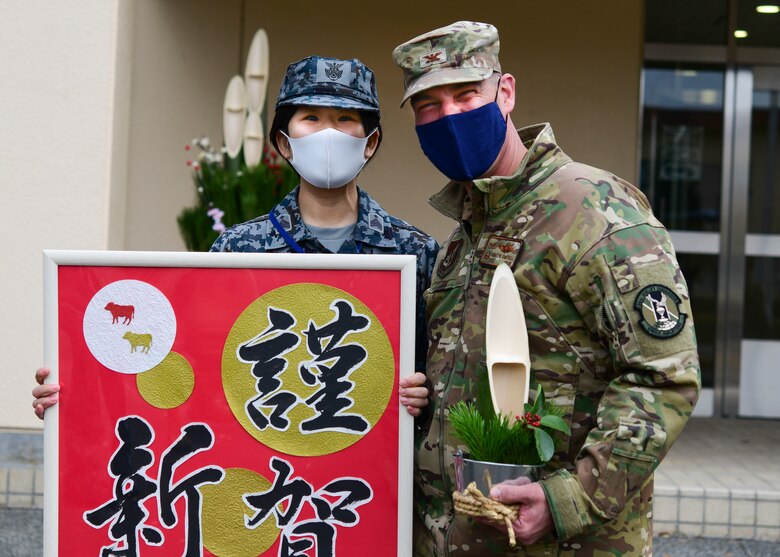 Japanese Airman gives gift to military commander