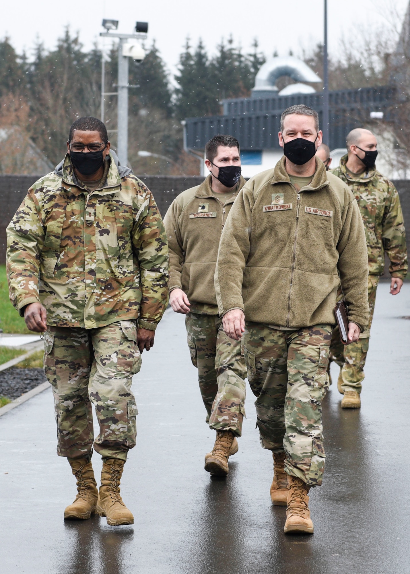 U.S. Air Force Maj. Gen. Randall Reed, Third Air Force commander, left, and Chief Master Sgt. Randy Kwiatkowski, Third Air Force command chief, visit the 702nd Munitions Support Squadron, Dec. 8, 2020, at Büchel Air Base, Germany. Reed and Kwiatkowski received a fresher understanding and familiarization with the current mission readiness of the 702nd MUNSS, and were able to interact with and recognize some of the hard work the Airmen have been doing. (U.S. Air Force photo by Senior Airman Melody W. Howley)