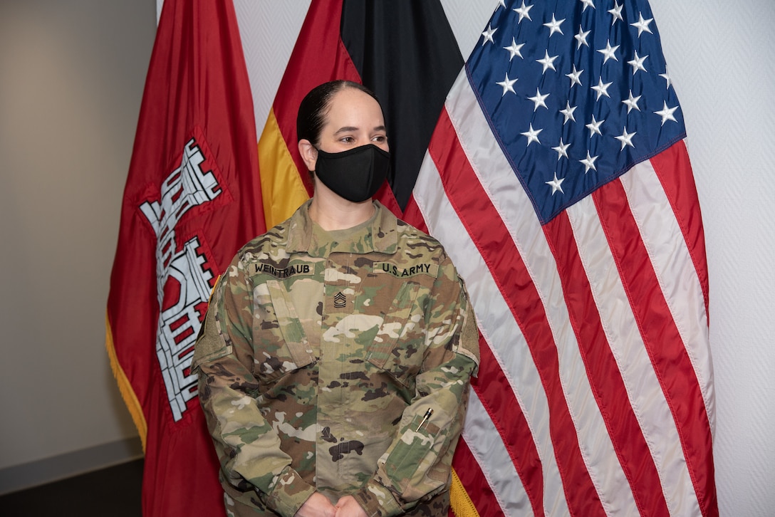 U.S. Army Master Sgt. Betsy Weintraub receives the Meritorious Service Medal from U.S. Army Corps of Engineers, Europe District commander.