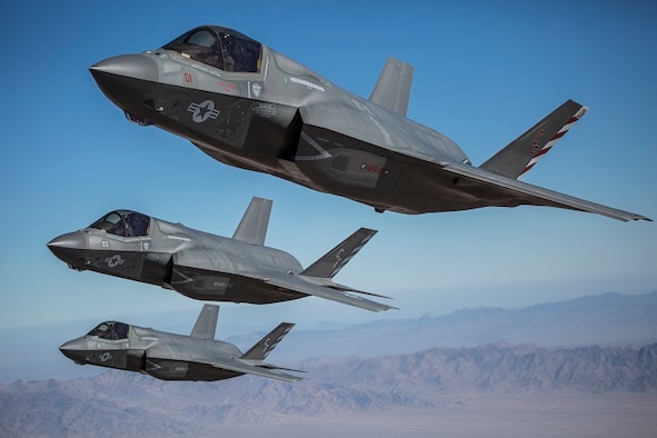 F-35B Lightning II aircraft, assigned to Marine Corps Air Station Miramar, Calif., conduct flight operations above Marine Corps Air Ground Combat Center Twentynine Palms, Calif., Oct. 4. The Kill Chain Integration Branch of the Special Programs Division of the Command, Control, Communications, Intelligence and Networks Directorate, headquartered at Hanscom Air Force Base, Mass., has helped to field Interim Full Motion Video, a combination of a video stream and associated location metadata in one video file, that will assist ground units in coordinating air action against hostile targets. (U.S. Marine Corps photo by Lance Cpl. Becky Calhoun/Released)