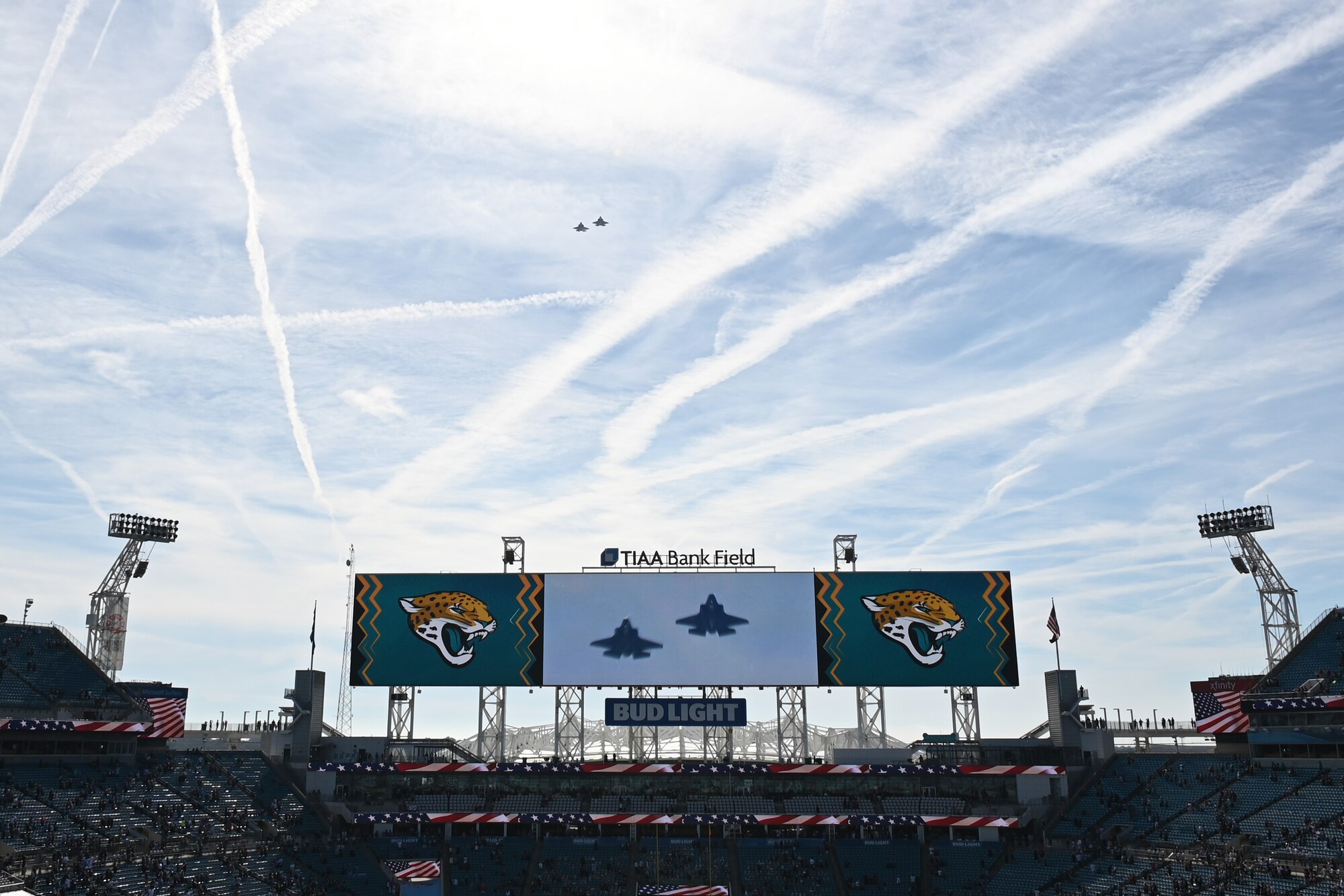 Two F-35A Lightning II pilots flyover the Jacksonville Jaguars football game in the air at TIAA Bank Stadium in Jacksonville, Florida, Dec. 11, 2020. The flyover was part of various outreach events around Jacksonville. (U.S. Air Force photo by Senior Airman Heather LeVeille)