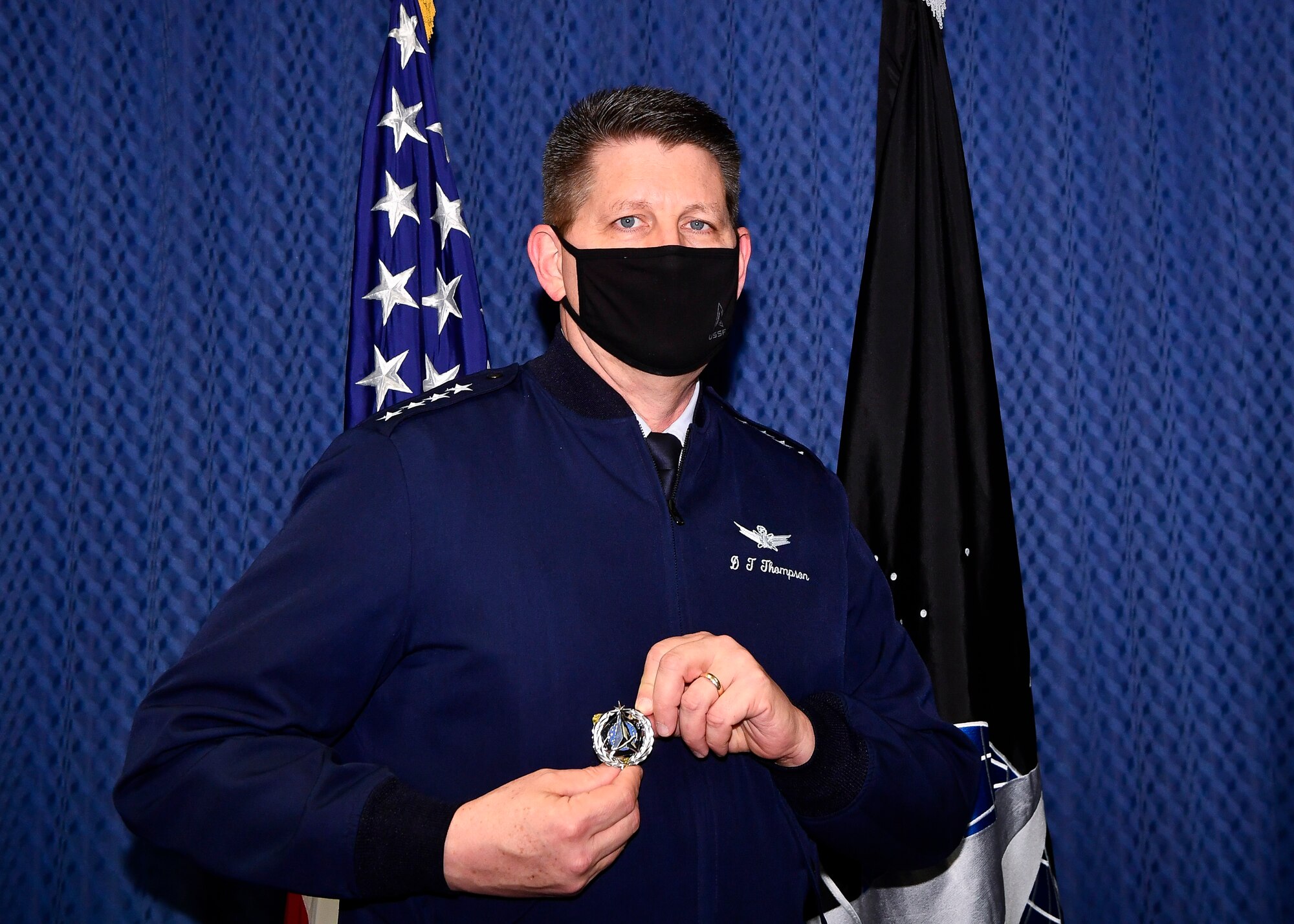 Vice Chief of Space Operations Gen. David D. Thompson holds the new U.S. Space Force Space Staff Badge during an unveiling ceremony at the Pentagon, Arlington, Va., Dec. 11, 2020. Service members assigned to Space Force at the Pentagon will wear the badge.