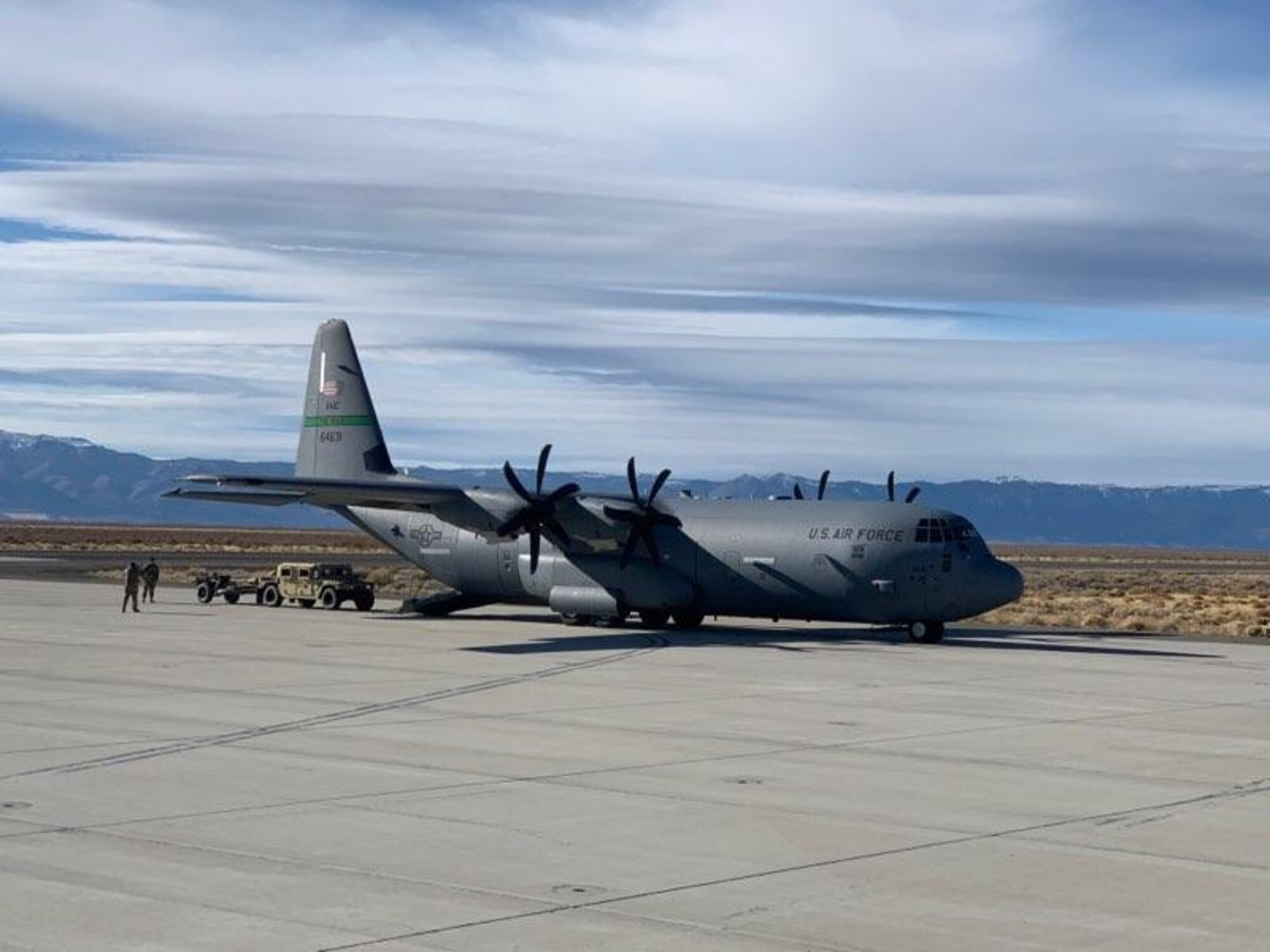 a plane sits on a flight line