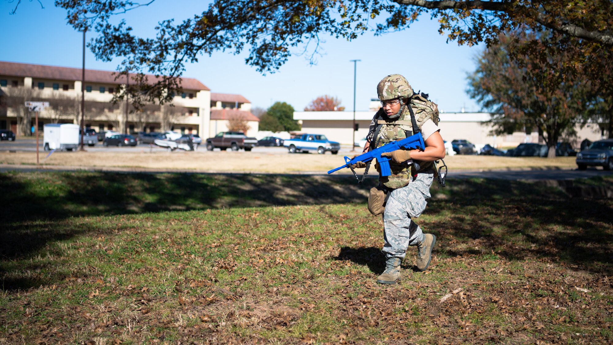 Staff Sgt. Jelisa Adams, 2nd Healthcare Operations Squadron medical technician, runs during a Tactical Combat Casualty Care (TCCC) field training exercise at Barksdale Air Force Base, La., Dec. 9, 2020.