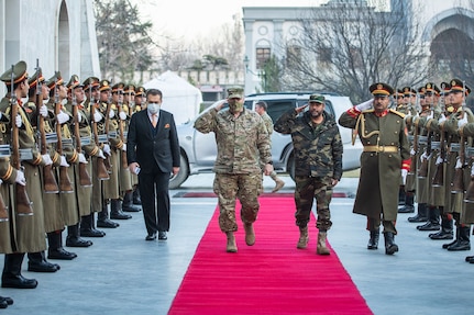 Gen. Mark A. Milley, chairman of the Joint Chiefs of Staff, walks through an honor cordon with Gen. Mohammad Yasin Zia, Chief of General Staff of the Afghan Armed Forces at the presidential palace prior to a meeting with Ashraf Ghani, President of the Islamic Republic of Afghanistan in Kabul, Dec. 17, 2020.  The senior leaders discussed the current security environment in Afghanistan.