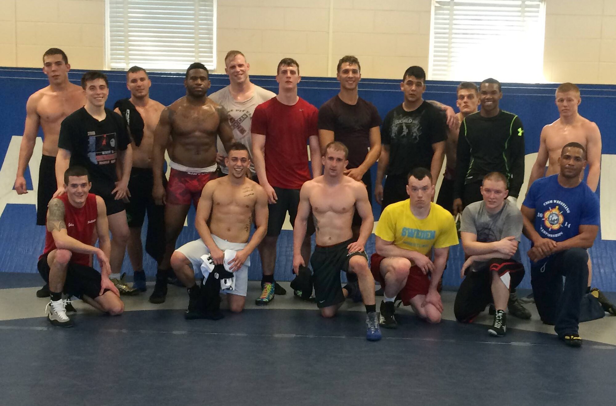 Master Sgt. Kyle Atkinson (top row third from left), an enlisted accessions recruiter with the 341st Recruiting Squadron, Katy, Texas, with a group of Airmen at the Air Force Wrestling Team tryouts in 2015 at Joint Base McGuire-Dix-Lakehurst, New Jersey.