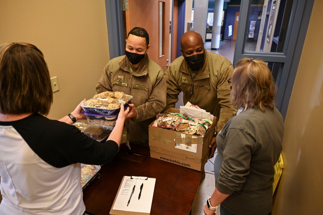 Langley Spouses Club spread holiday cheer to junior Airmen