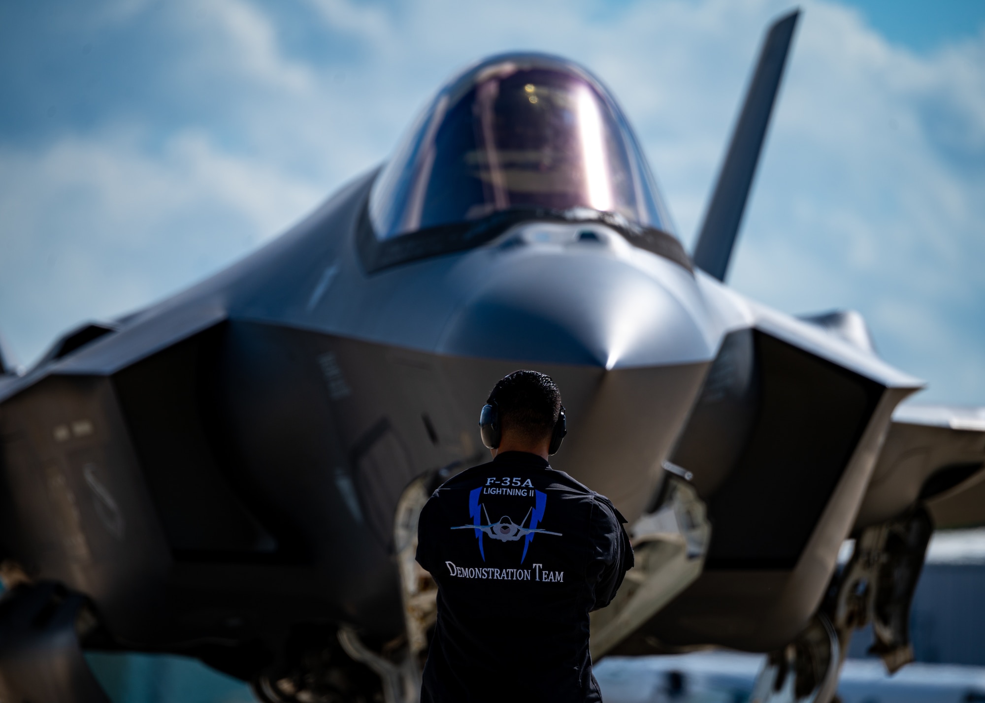 An F-35A Lightning II Demonstration Team crew chief prepares to launch out an F-35 for a flight.