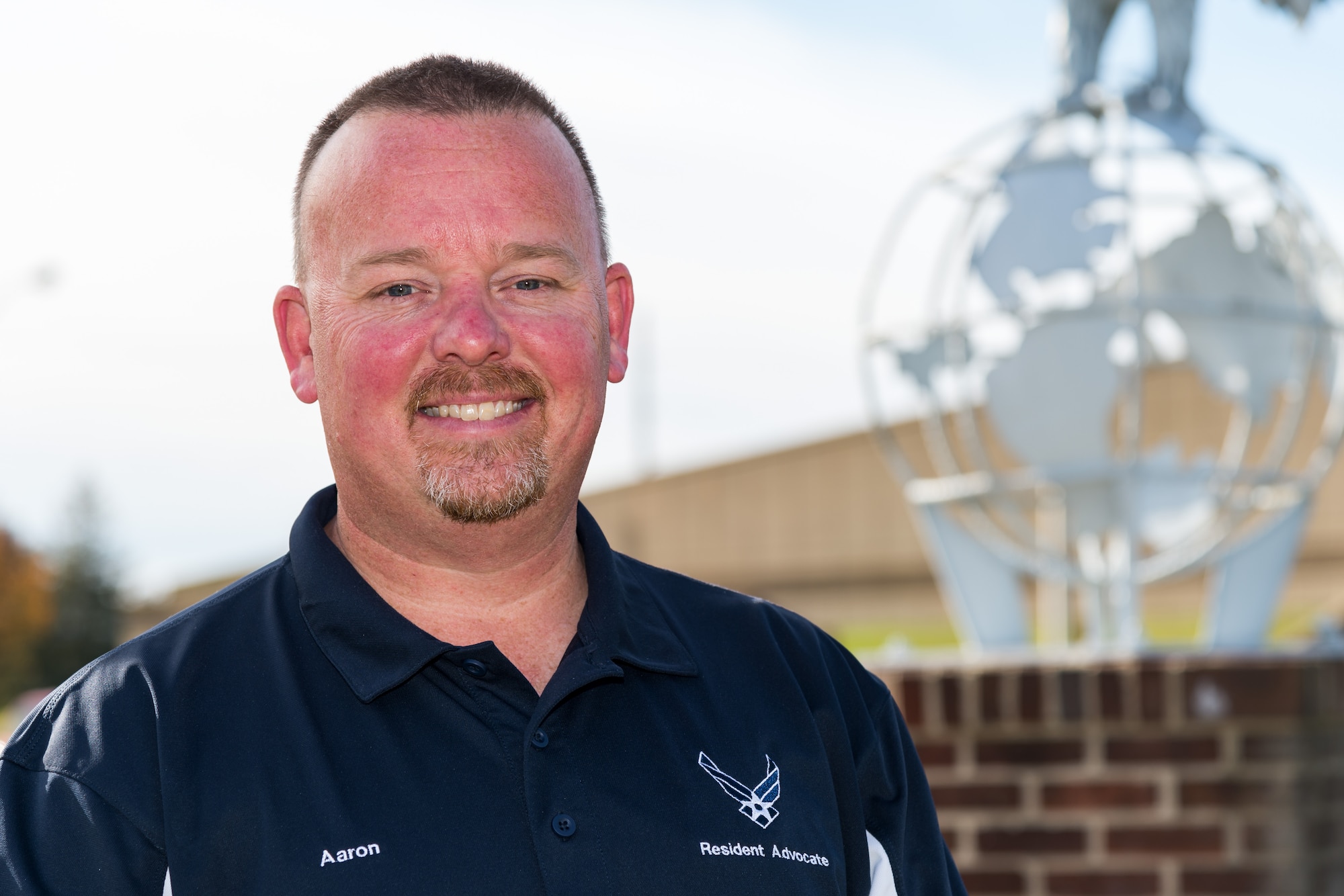 Aaron Lewis, 436th Airlift Wing privatized housing resident advocate, poses for a photo Dec. 3, 2020, on Dover Air Force Base, Delaware. Lewis was appointed as the first 436th Airlift Wing privatized housing resident advocate, who reports directly to the wing commander and informs wing senior leaders on issues or concerns. (U.S. Air Force photo by Roland Balik)