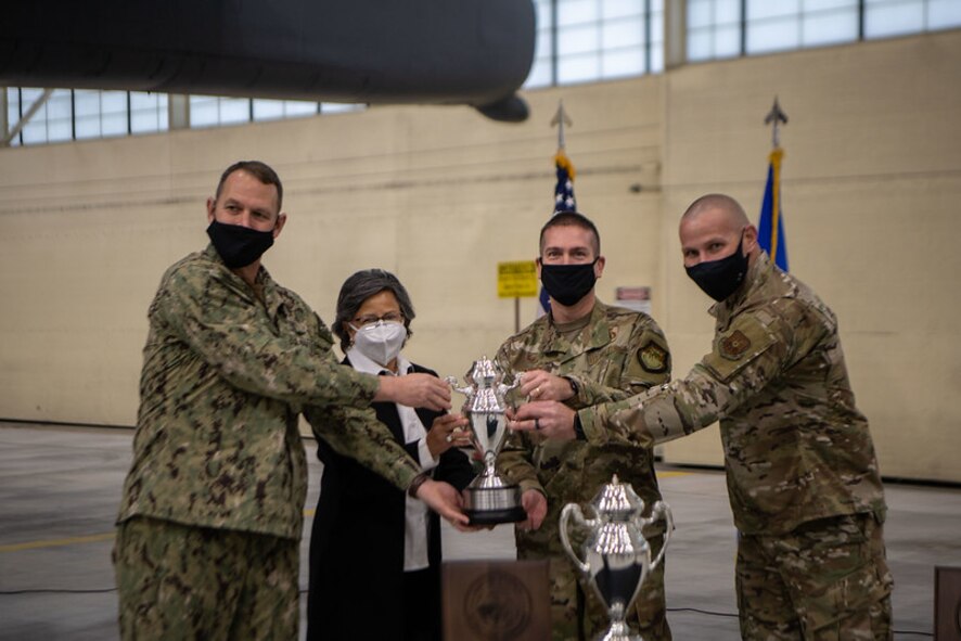 The Omaha trophy is presented to the 91st Missile Wing Dec. 15, 2020, at Minot Air Force Base, North Dakota. Rear Adm. William W. Wheeler III, U.S. Strategic Command Chief of Staff, visited Team Minot to present the Omaha Trophy to both the 91st Missile Wing and the 5th Bomb Wing. (U.S. Air Force photo by Airman 1st Class Jesse Jenny)