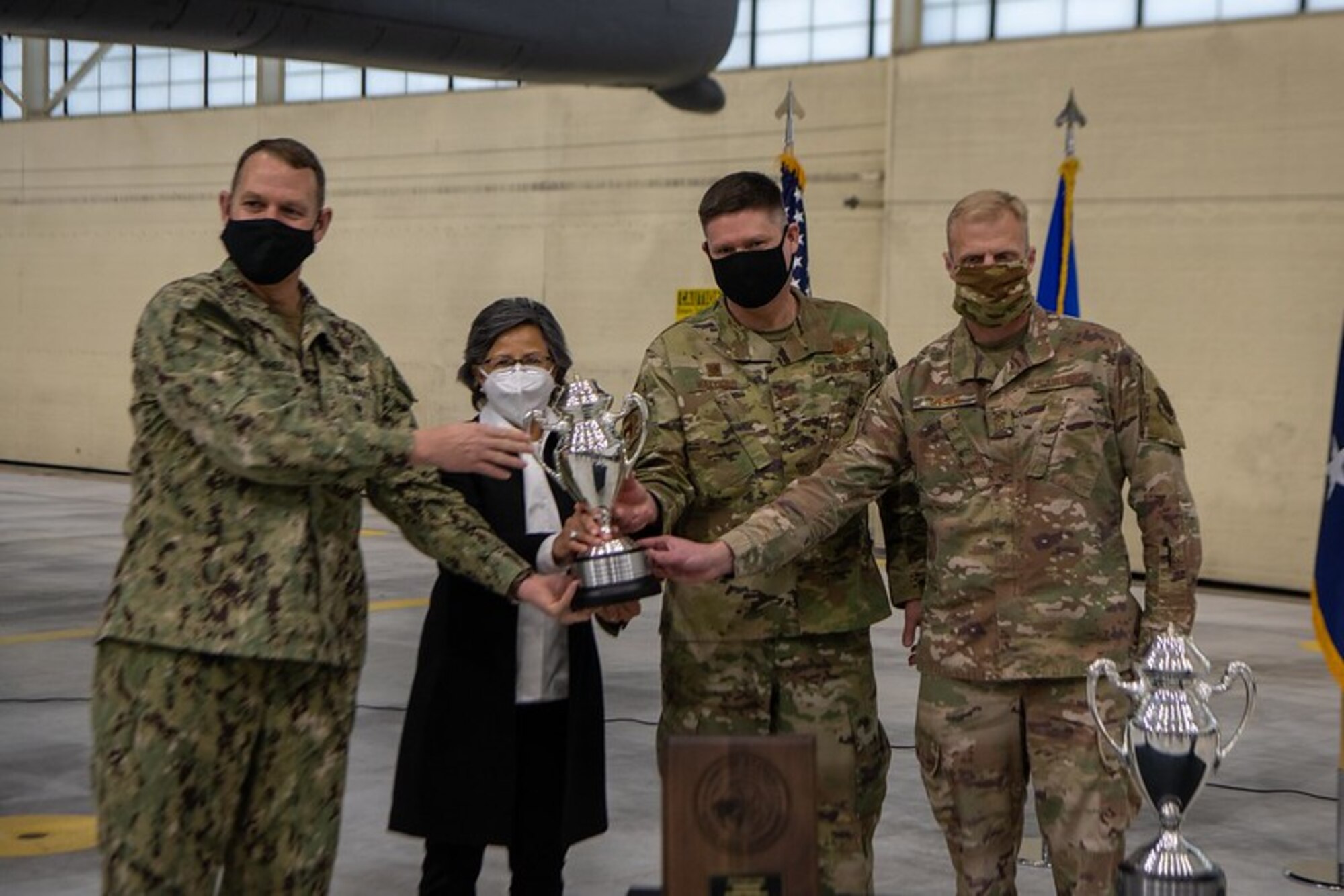 The Omaha trophy is presented to the 5th Bomb Wing Dec. 15, 2020, at Minot Air Force Base, North Dakota. Rear Adm. William W. Wheeler III, U.S. Strategic Command Chief of Staff, visited Team Minot to present the Omaha Trophy to both the 91st Missile Wing and the 5th Bomb Wing. (U.S. Air Force photo by Airman 1st Class Jesse Jenny)