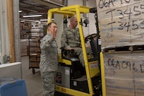 Airmen assigned to the 158th Logistics Readiness Squadron, Vermont Air National Guard, assist Vermont Health Department workers prepare medical equipment for redistribution March 31, 2020. The equipment includes surgical masks and gowns, respirators, and other assorted safety gear that will be sent to hospitals, and emergency services all over Vermont. (Photo by U.S. Army National Guard Sgt. 1st Class Jason Alvarez)